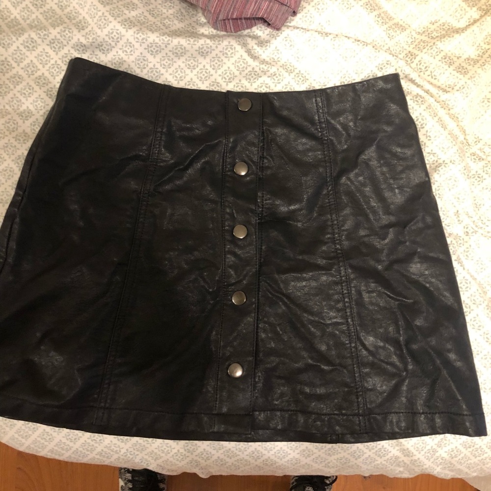 Black leather mini skirt